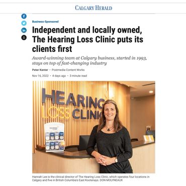 Hannah Lee at The Hearing Loss Clinic reception desk.