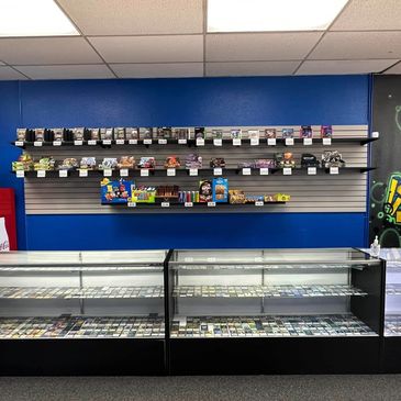 A store counter and wall display Magic the Gathering cards