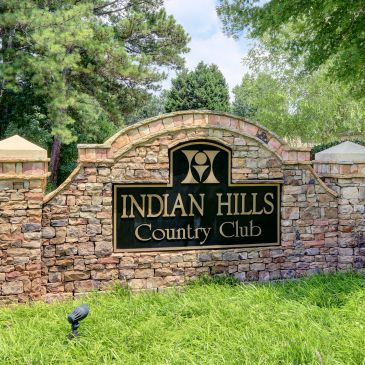 Stone sign for Indian Hills Country Club.