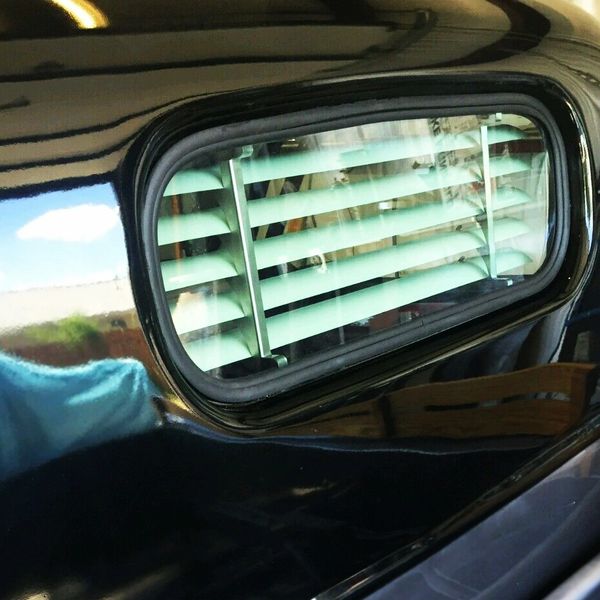 Auto Venetian blinds on a truck.