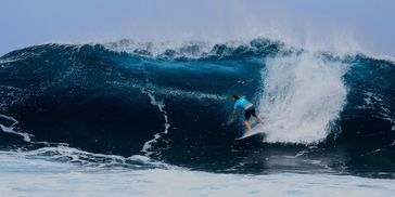 Surfer on big wave. Image courtesy of Johannes Andersson