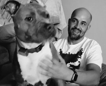 Owner of Skky Dog Walker, Skky, with his bluenose pitbull Jax.