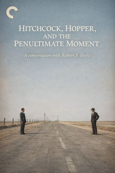 Two men stand apart on a long empty road under an expansive sky.