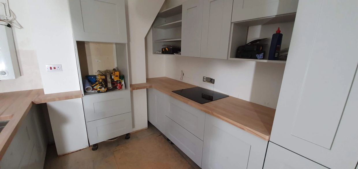 Professional kitchen fitting project completed by Sutton Building Services.