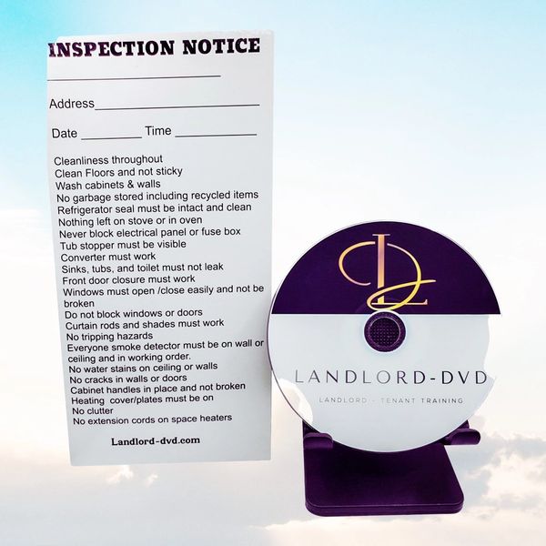 An inspection notice next to a DVD