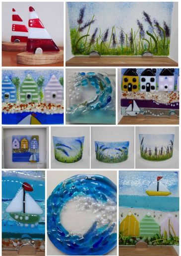 Collection of colorful fused glass art featuring houses, sailboats, waves, and nature scenes.