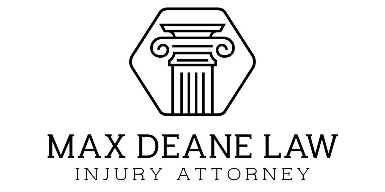 Logo of Max Deane Law Injury Attorney with a classical column symbol.