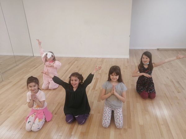 children doing yoga 