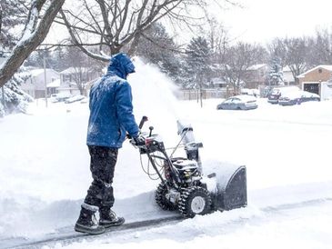 Snow clearing with machine in Saltsjöbaden, Nacka