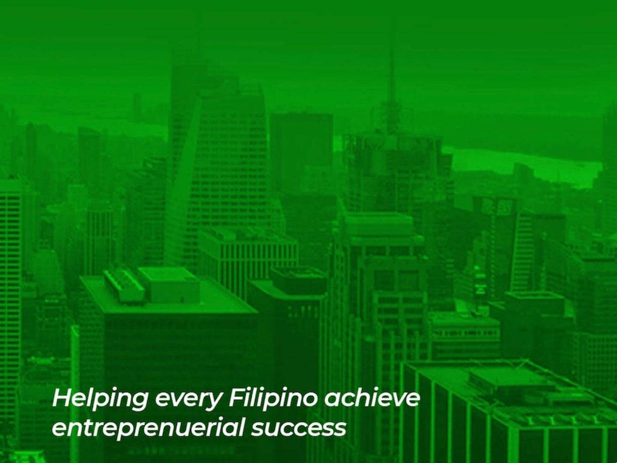City skyline with the phrase about Filipino entrepreneurial success.