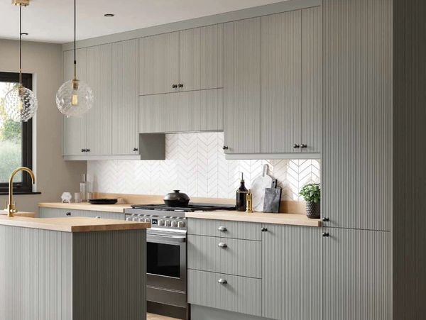 light green kitchen doors with beech worktops