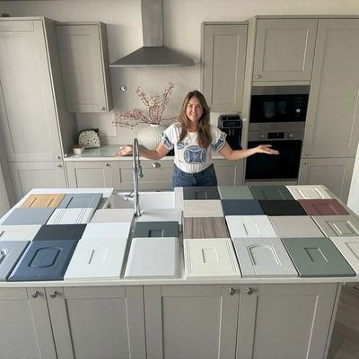 sample door colours and styles spread out across an island unit