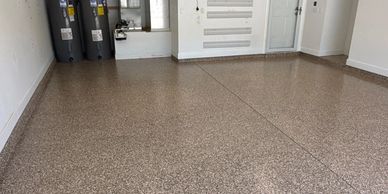 Professional flake garage floor coating installed by Xtreme Floors in Jacksonville, Florida