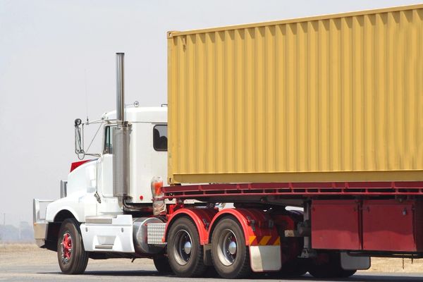 Refrigerator truck moving on the road 