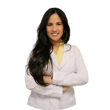 Meyssell Chong, APRN, smiling in a white medical coat