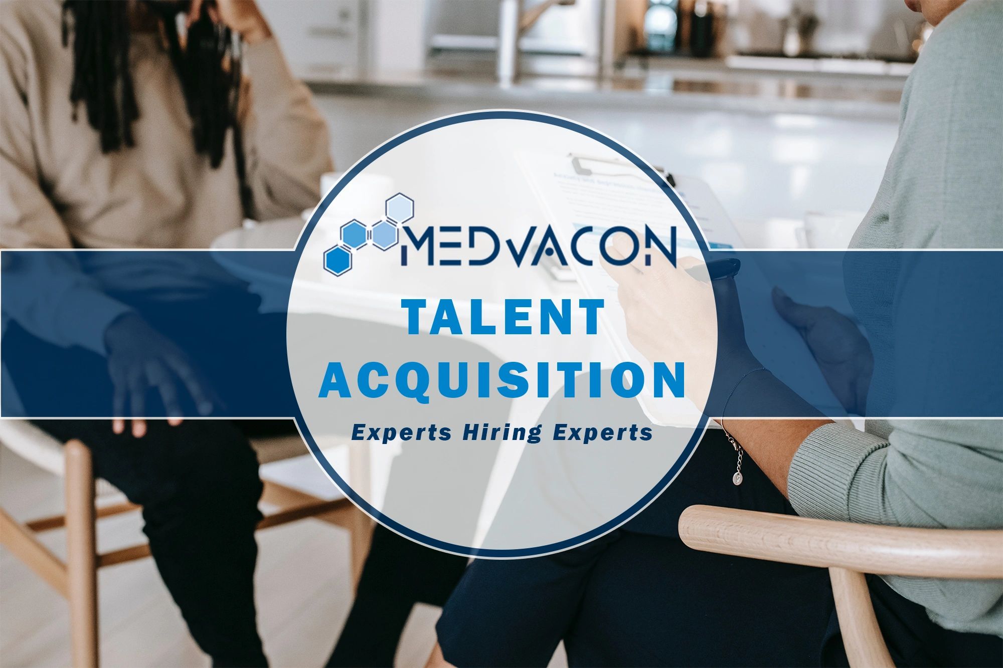 2 people chatting at an interview. "Medvacon Talent Acquisition" "experts hiring experts"