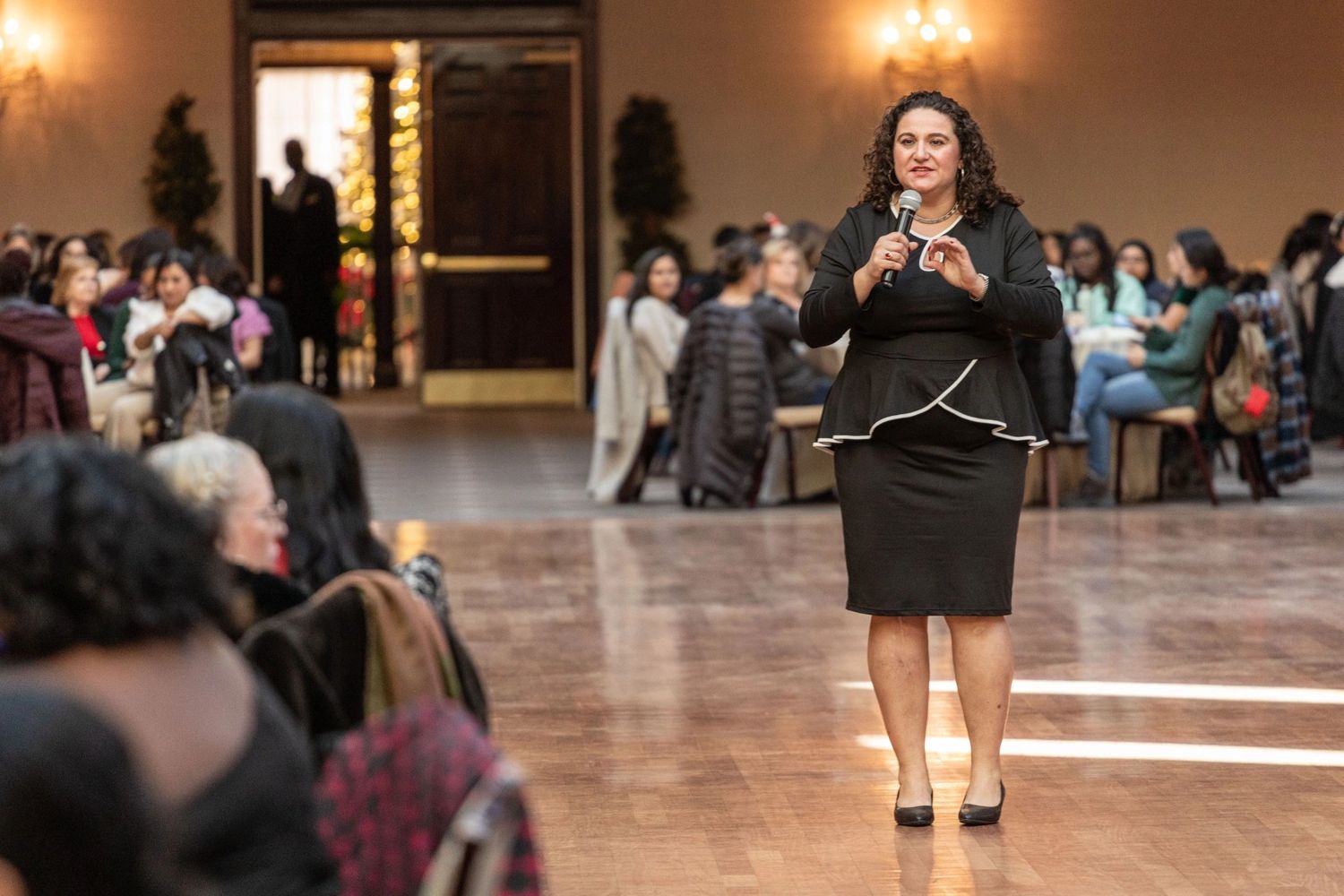 Powerful Woman speaking to an audience