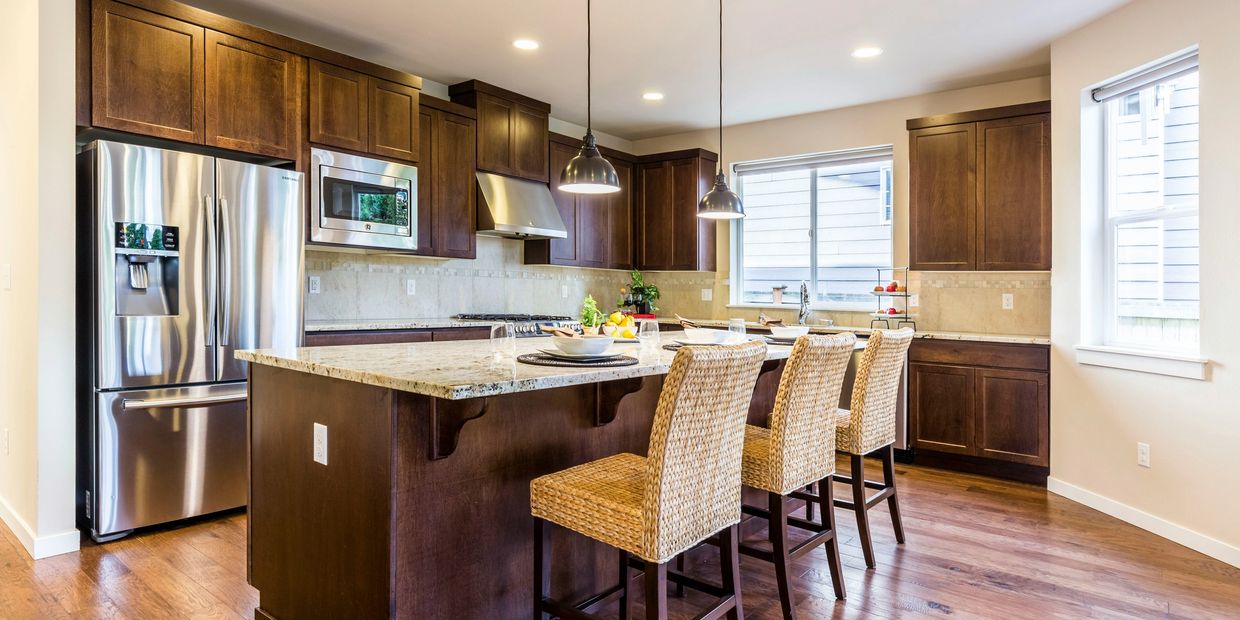 St. Cloud, MN - kitchen remodel, custom cabinets, large island, new appliances, new pendant lights