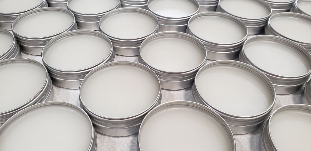 Cutting Board Butter in tins.