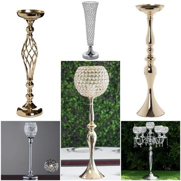 Elegant gold and silver candle holders with crystal accents for decorative use.
