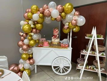 balloon decor and candy dessert cart