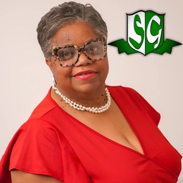 Woman in red dress with pearl necklace smiling beside green SG logo.