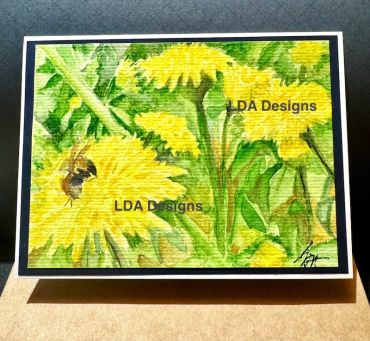 Watercolor painting of yellow dandelions with a bee.