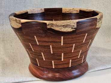 Segmented exotic wood bowl.