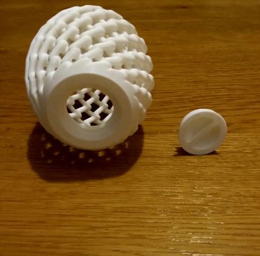 This is a picture of the easter egg on it side with the small compartment open in the bottom.