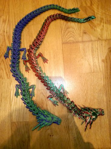 These are 2 big flexible dragons that look cool feel cool and are a great toy.