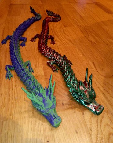 These are 2 big flexible dragons that look cool feel cool and are a great toy.