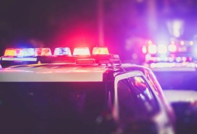 Police lights on vehicle lit up on the job