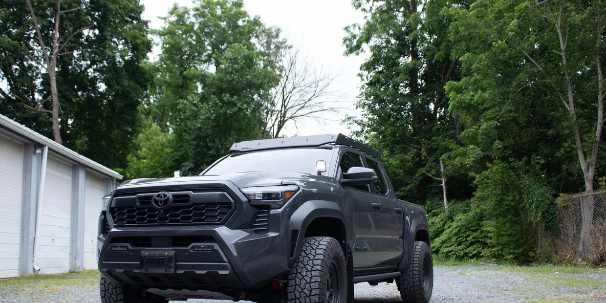 Toyota Tacoma upfitted with the best off road capable lights done in house at Comm Lynx 