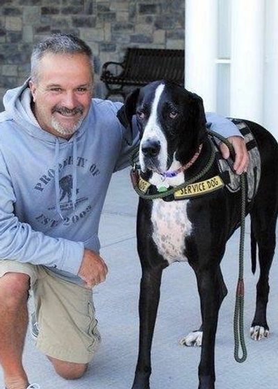 Scott with his Great Dane Service Dog, Dash; an integral part of his presentations and his life.