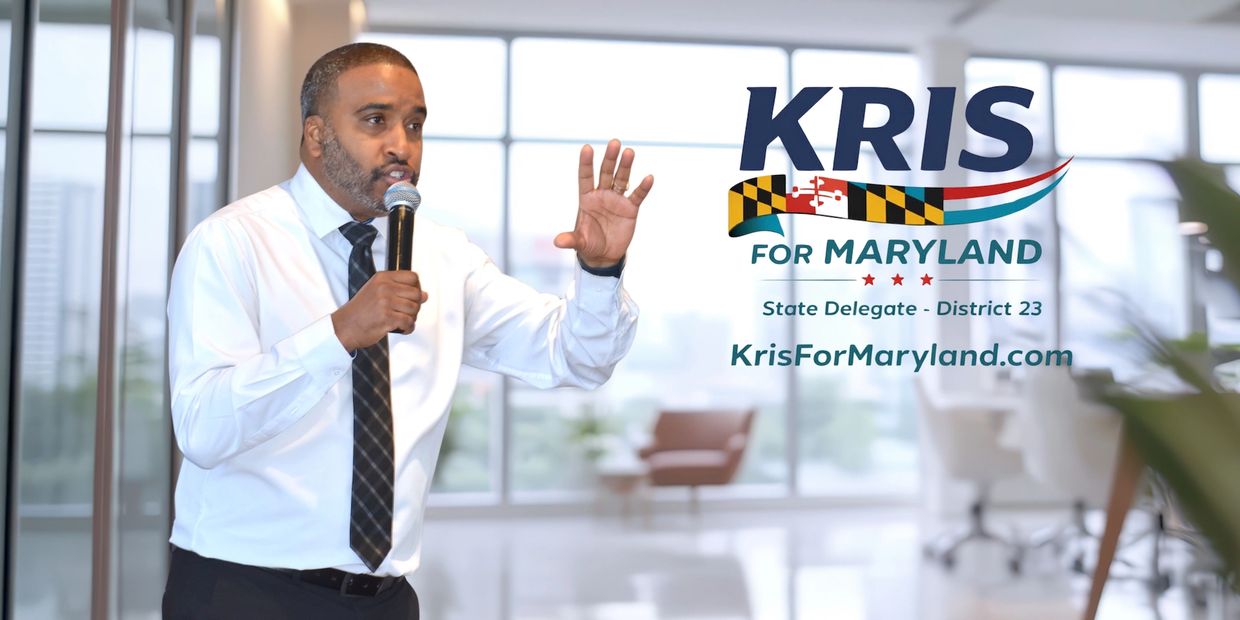 Candidate Kris speaking with a microphone for Maryland State Delegate campaign.