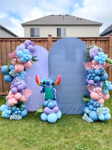 Includes backdrop, custom message, balloons. Set up and tear down