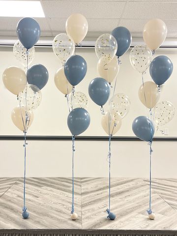 Beautiful dusty blue, cream and confetti helium balloons for a birthday celebration.