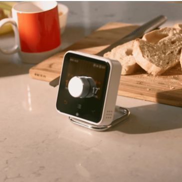 Smart kitchen thermometer on a counter.