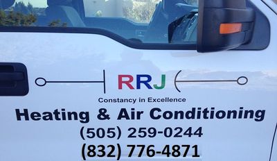 RRJ Heating and Air Conditioning text on car