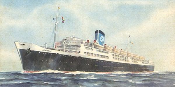 A vintage passenger ship named Ascania sailing on the sea.