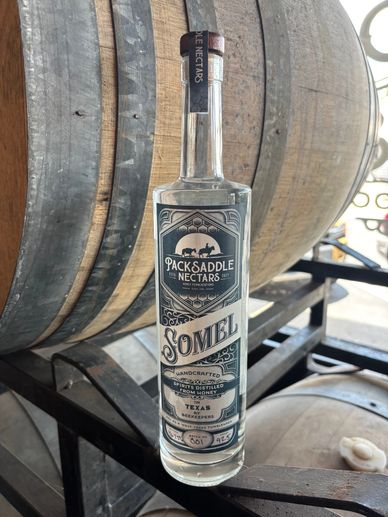 A bottle of Pack Saddle Nectars Somel spirit.