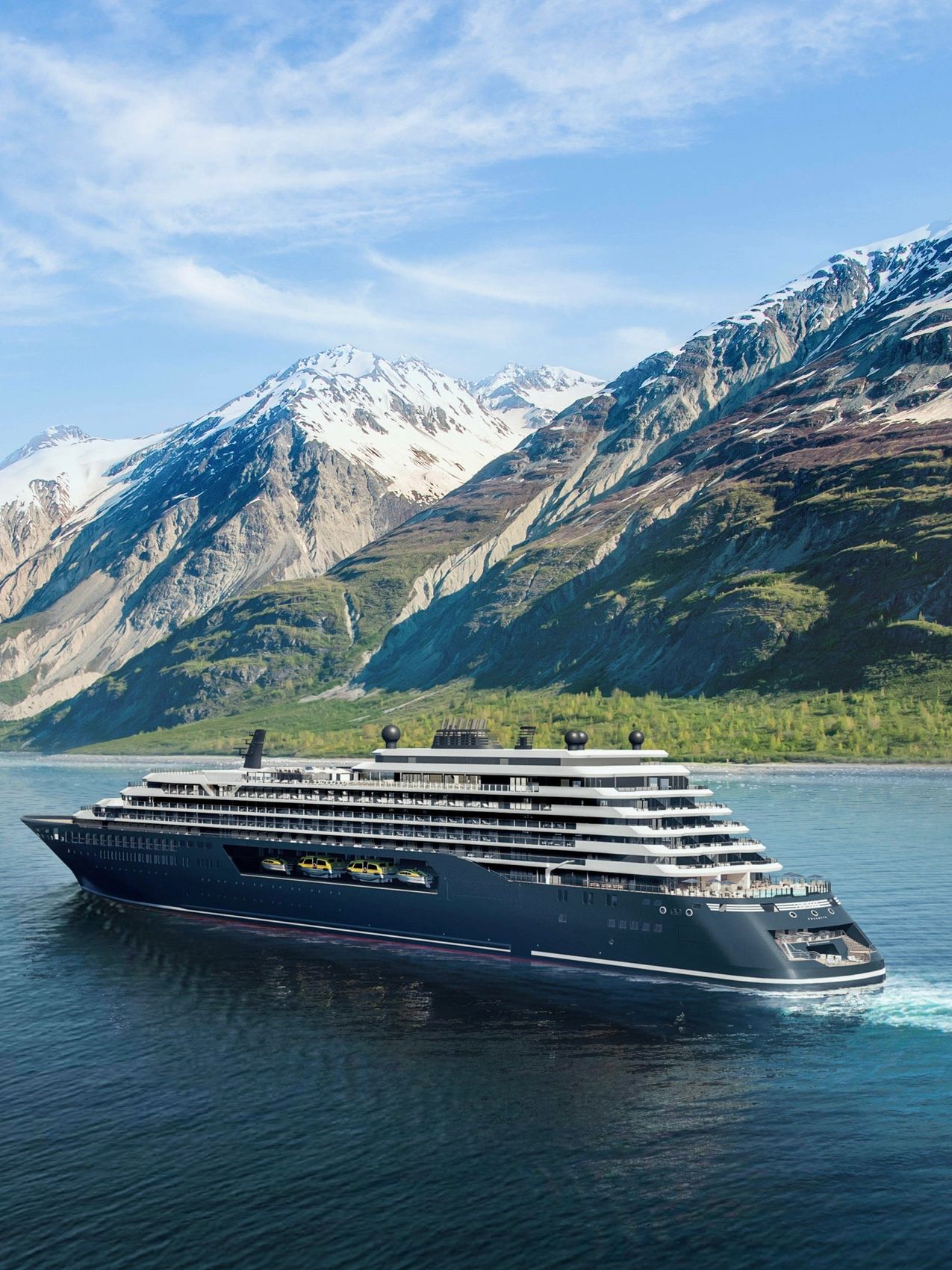 A modern cruise ship sails through calm waters near snow-capped mountains.