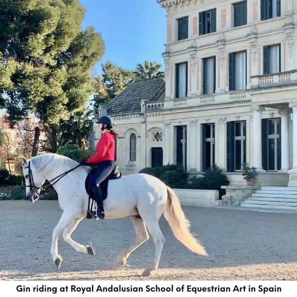 Gin riding at Royal Andalusian School of Equestrian Art in Spain.
