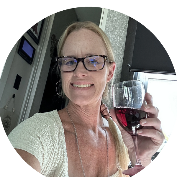 Woman drinking wine.