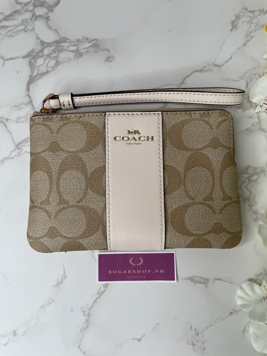 Coach wristlet in light khaki chalk