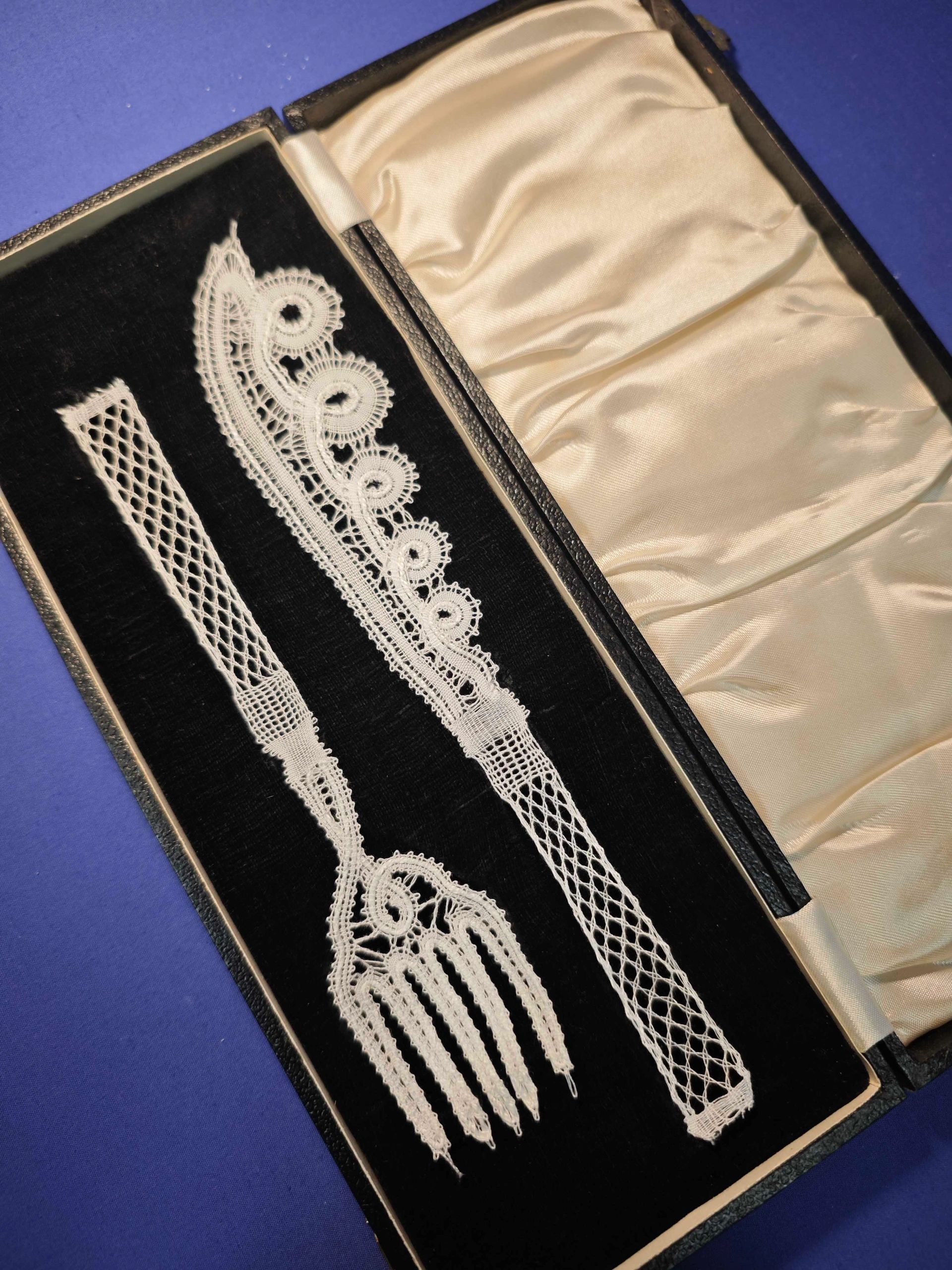 Antique lace fork and knife in a vintage box.