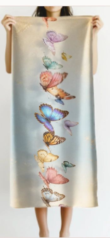Scarf with colorful butterfly design.