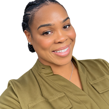 Smiling woman in an olive green shirt with braided hair.