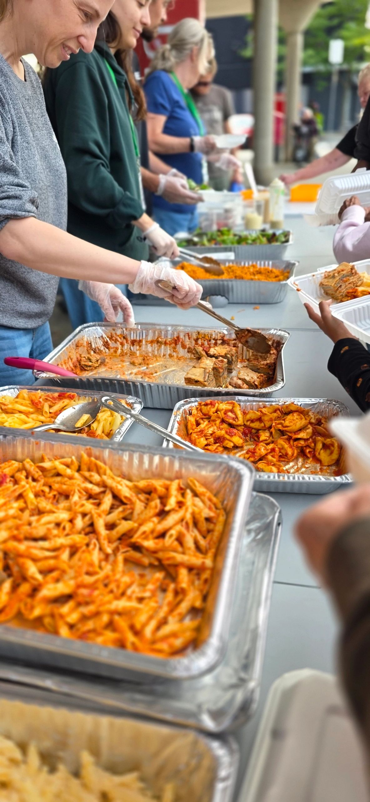 Food for Now Etobicoke.  Friday Night Outreach.  Serving people on the sidewalk.  Lakeshore village.