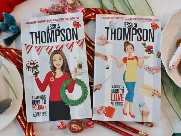 2 books with Christmas goodies and ribbon